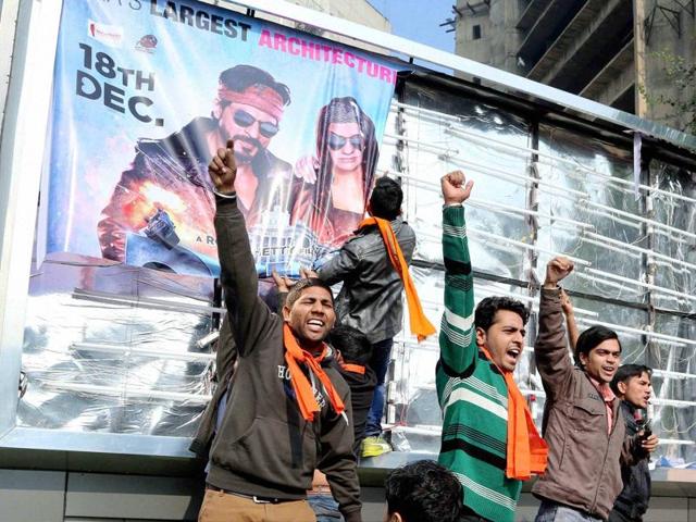 Hindu Sena activists protest against Shaha Rukh Khan's Dilwale in New Delhi on Friday. (PTI)