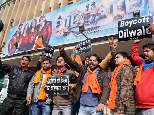 Hindu Sena activists protest against actor Shah Rukh Khan's Dilwale in New Delhi on Friday. (PTI)