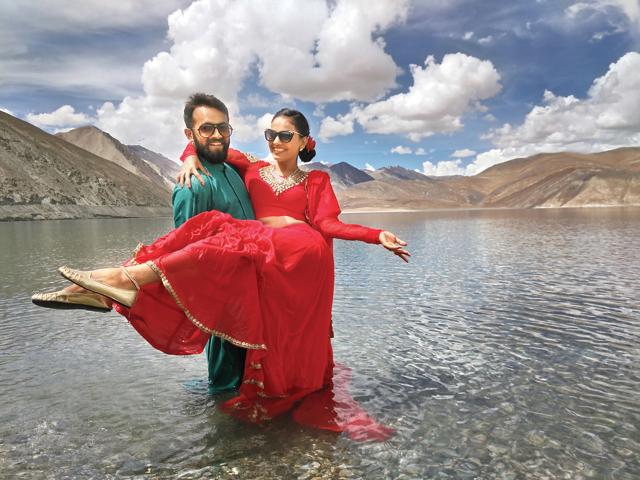 Action Jacksons: Shanaya and Nitin Arora indulged their adventurous sides during their pre-wedding shoot by wading into the freezing waters of Pangong Tso lake in Ladakh. (Photo: Simar) Action Jacksons: Shanaya and Nitin Arora indulged their adventurous sides during their pre-wedding shoot by wading into the freezing waters of Pangong Tso lake in Ladakh. (Photo: Simar)