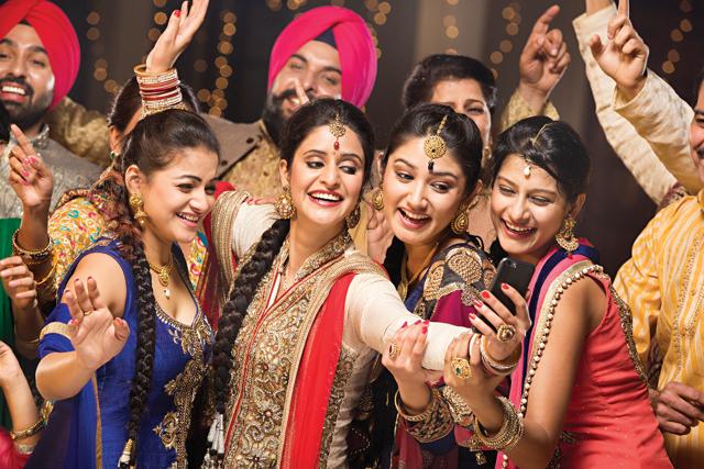 But first, let me take a selfie: The conversations and connections that pictures spark off are way more exciting than any stilted chit-chat at a big family wedding. (Photo: Images Bazaar) But first, let me take a selfie: The conversations and connections that pictures spark off are way more exciting than any stilted chit-chat at a big family wedding. (Photo: Images Bazaar)