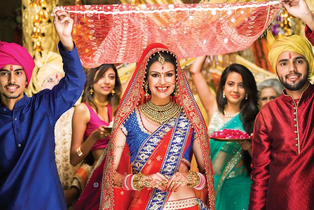 Picture perfect: The official album will have beautifully lit photos of the bride walking down the aisle for the jaimala (Photo: Images Bazaar) Picture perfect: The official album will have beautifully lit photos of the bride walking down the aisle for the jaimala (Photo: Images Bazaar)