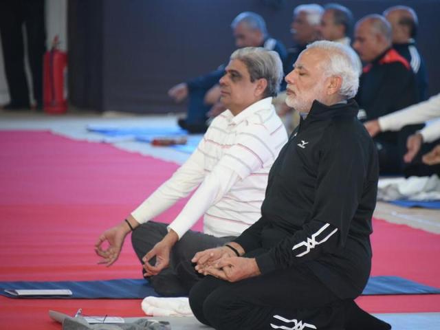 Modi will lead around 150 top cops from all the security agencies, Home minister Rajnath Singh and national security adviser Ajit Doval in 45-minute yoga sessions on December 19 and 20. (ht PHOTO) Modi will lead around 150 top cops from all the security agencies, Home minister Rajnath Singh and national security adviser Ajit Doval in 45-minute yoga sessions on December 19 and 20. (ht PHOTO)