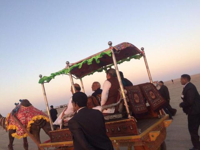 PM Narendra Modi enjoys a camel cart ride after surya namaskar and yoga session on Saturday morning. (HT PHOTO) PM Narendra Modi enjoys a camel cart ride after surya namaskar and yoga session on Saturday morning. (HT PHOTO)