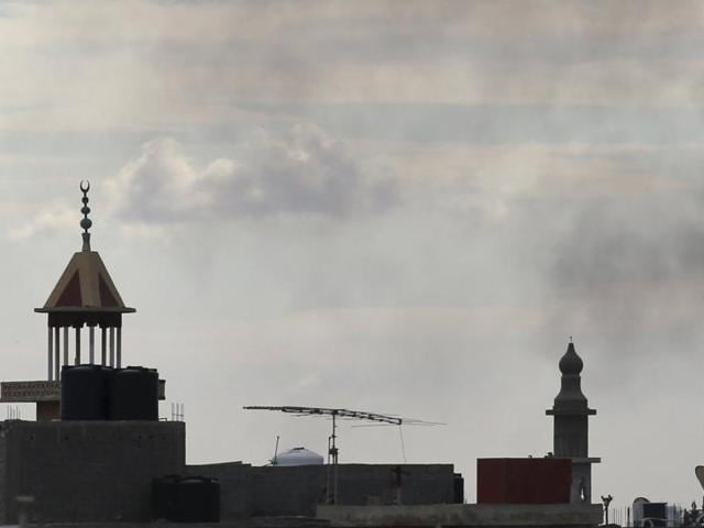 Black smoke billows in the sky above areas where clashes are taking place between pro-government forces, who are backed by the locals, and the Shura Council of Libyan Revolutionaries, an alliance of former anti-Gaddafi rebels who have joined forces with the Islamist group Ansar al-Sharia, in Benghazi, Libya. (Reuters) Black smoke billows in the sky above areas where clashes are taking place between pro-government forces, who are backed by the locals, and the Shura Council of Libyan Revolutionaries, an alliance of former anti-Gaddafi rebels who have joined forces with the Islamist group Ansar al-Sharia, in Benghazi, Libya. (Reuters)