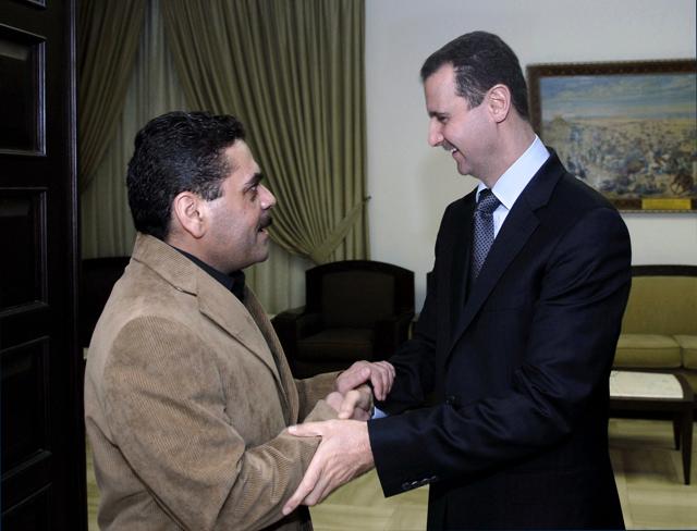 In this file photo, Syrian President Bashar Assad shakes hands with Samir Kantar in Damascus, Syria. (AP) In this file photo, Syrian President Bashar Assad shakes hands with Samir Kantar in Damascus, Syria. (AP)