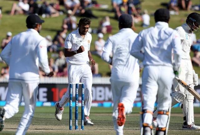 Suranga Lakmal of Sri Lanka celebrates after taking the wicket of Mitchell Santner of New Zealand on day three of the second Test cricket match between New Zealand and Sri Lanka at Seddon Park. (AFP Photo) Suranga Lakmal of Sri Lanka celebrates after taking the wicket of Mitchell Santner of New Zealand on day three of the second Test cricket match between New Zealand and Sri Lanka at Seddon Park. (AFP Photo)