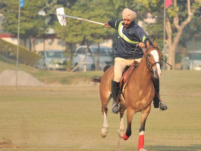 A large number of horse riders across Punjab have been taking part in the three-day horse show. A Punjab Police rider is seen participating during the event. (ParDeep pandit/Ht )