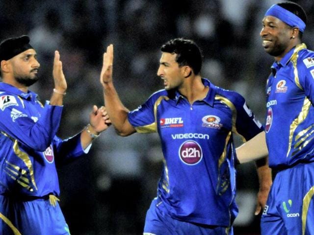 Mumbai Indians bowler Rishi Dhawan celebrates the wicket of a Highveld Lions batsman during their Champions League Twenty 20 cricket match in Jaipur. Mumbai Indians bowler Rishi Dhawan celebrates the wicket of a Highveld Lions batsman during their Champions League Twenty 20 cricket match in Jaipur.