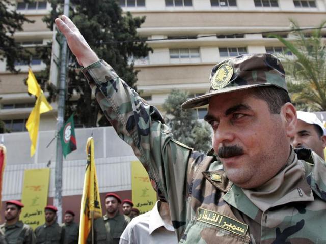 In this file photo, released prisoner Samir Kantar salutes people as he arrives to pay respect at the grave of slain top Hezbollah military commander Imad Mughniyeh in Lebanon. (AP) In this file photo, released prisoner Samir Kantar salutes people as he arrives to pay respect at the grave of slain top Hezbollah military commander Imad Mughniyeh in Lebanon. (AP)