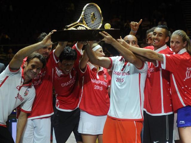 Singapore Slammers team members, joined by IPTL founder Mahesh Bhupathi, celebrate with the trophy after winning the International Premier Tennis League (IPTL) in Singapore on December 20, 2015. (AFP) Singapore Slammers team members, joined by IPTL founder Mahesh Bhupathi, celebrate with the trophy after winning the International Premier Tennis League (IPTL) in Singapore on December 20, 2015. (AFP)