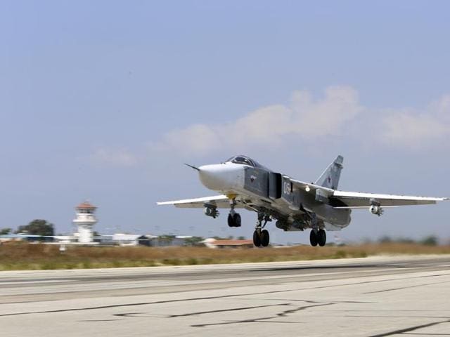 A file photo of a Russian SU-24M jet fighter armed with laser guided bombs. Airstrikes believed to have been carried out by Russian warplanes have killed scores in the rebel-held city of Idlib in Syria.(AP Photo)