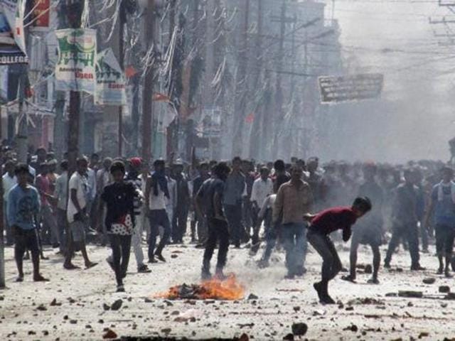 A protester burns a tyre on the highway connecting Nepal to India during a general strike called by the Madhesi protesters. Nepal’s government has decided to amend its new Constitution to address the demands of the Madhesi community, who constitute 52% of the country’s total population.(REUTERS Photo) A protester burns a tyre on the highway connecting Nepal to India during a general strike called by the Madhesi protesters. Nepal’s government has decided to amend its new Constitution to address the demands of the Madhesi community, who constitute 52% of the country’s total population.(REUTERS Photo)