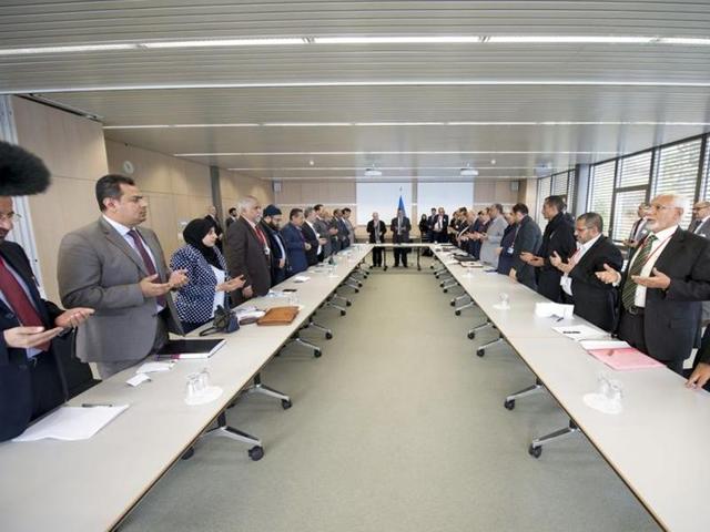 UN Secretary-General Special Envoy Ismail Ould Cheikh Ahmed (C) open with delegations from Sanaa at the Yemen peace talks in Switzerland. (REUTERS) UN Secretary-General Special Envoy Ismail Ould Cheikh Ahmed (C) open with delegations from Sanaa at the Yemen peace talks in Switzerland. (REUTERS)