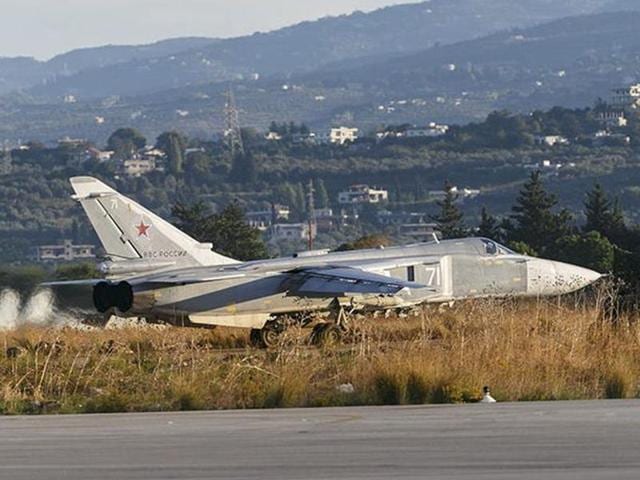 A video frame grab by Haberturk TV shows a Russian warplane shot down by Turkey on fire before crashing on a hill as seen from Hatay province, Turkey. (AP Photo) A video frame grab by Haberturk TV shows a Russian warplane shot down by Turkey on fire before crashing on a hill as seen from Hatay province, Turkey. (AP Photo)