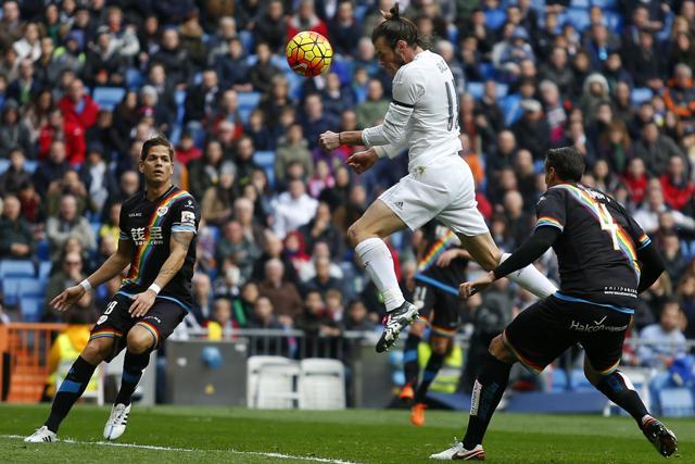 Gareth Bale heads home the fourth goal of the match to level the scores 2-2. (AP Photo) Gareth Bale heads home the fourth goal of the match to level the scores 2-2. (AP Photo)