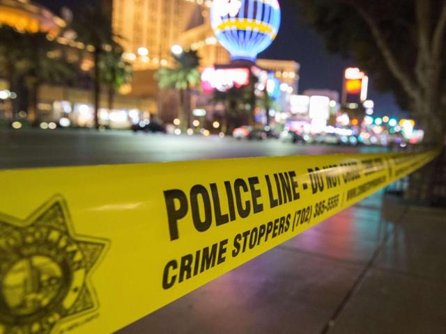 A police line blocks off part of the Las Vegas Strip after a car ran into a group of pedestrians between Planet Hollywood, where the Miss Universe pageant took place, and the Paris Las Vegas Hotel in Las Vegas, Nevada, on Sunday. (AFP photo) A police line blocks off part of the Las Vegas Strip after a car ran into a group of pedestrians between Planet Hollywood, where the Miss Universe pageant took place, and the Paris Las Vegas Hotel in Las Vegas, Nevada, on Sunday. (AFP photo)