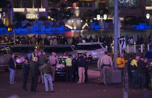 Police and local officials investigate a part of the Las Vegas Strip. (AFP photo) Police and local officials investigate a part of the Las Vegas Strip. (AFP photo)