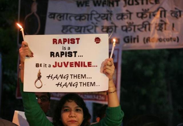 A student activist holds flayers with candles while protesting against the release of juvenile convict of the 16 December gangrape at Jantar Mantar, in New Delhi. (HT Photo) A student activist holds flayers with candles while protesting against the release of juvenile convict of the 16 December gangrape at Jantar Mantar, in New Delhi. (HT Photo)