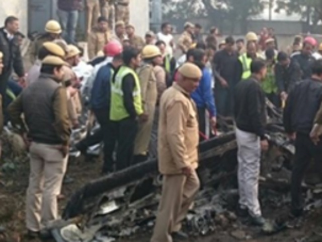 Rescue officials said the plane crashed just before the boundary wall of the airport near a railway crossing and the pilot may have tried to avoid residential areas to avoid more casualties.(HT Photo)