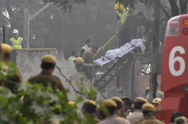 Eyewitnesses said the plane hit a wall outside the technical area of the airport before bursting into flames and then crashed into a water body. (Vipin Kumar/HT Photo) Eyewitnesses said the plane hit a wall outside the technical area of the airport before bursting into flames and then crashed into a water body. (Vipin Kumar/HT Photo)
