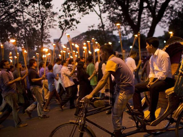 Demonstrators take part in a candle light march in Dhaka, Bangladesh, to demand justice for publishers and bloggers who were victims of attacks -- allegedly by Islamist radicals.(AP Photo)