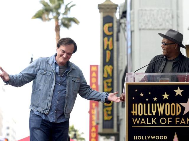 Filmmaker Quentin Tarantino is introduced by actor and event emcee Samuel L Jackson before the unveiling of his star on the Hollywood Walk of Fame in Hollywood, California. (REUTERS) Filmmaker Quentin Tarantino is introduced by actor and event emcee Samuel L Jackson before the unveiling of his star on the Hollywood Walk of Fame in Hollywood, California. (REUTERS)