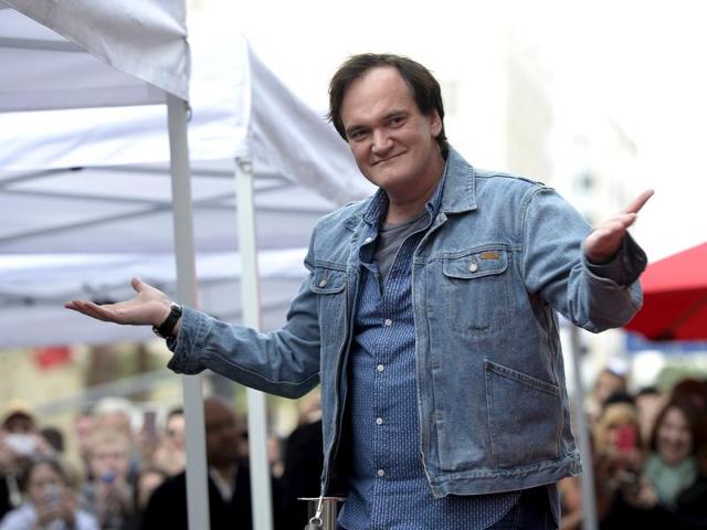 Filmmaker Quentin Tarantino acknowledges fans before the unveiling of his star on the Hollywood Walk of Fame in Hollywood. (REUTERS) Filmmaker Quentin Tarantino acknowledges fans before the unveiling of his star on the Hollywood Walk of Fame in Hollywood. (REUTERS)