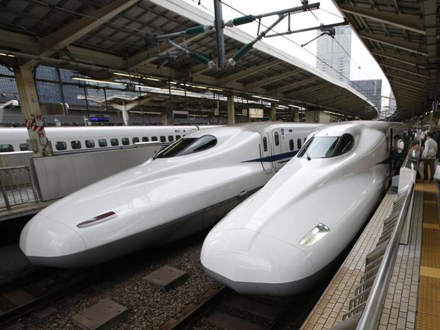 On December 12, India and Japan signed memorandum of understanding (MoU) for starting a bullet train service between two commercial hubs of the country, Mumbai and Ahmedabad. (AP) On December 12, India and Japan signed memorandum of understanding (MoU) for starting a bullet train service between two commercial hubs of the country, Mumbai and Ahmedabad. (AP)
