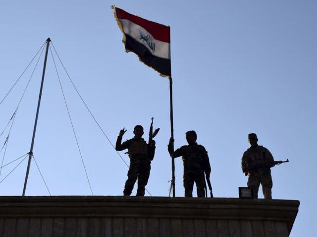 On Dec 21, 2015, Iraqi soldiers planted the national flag over a government building in Ramadi as security forces advance their position in northern Ramadi, 70 miles (115 km) West of Baghdad, Iraq. Iraqi forces on Tuesday reported progress in the military operation to retake the city of Ramadi from the Islamic State group, saying they made the most significant incursion into the city since it fell to the militants in May. (AP) On Dec 21, 2015, Iraqi soldiers planted the national flag over a government building in Ramadi as security forces advance their position in northern Ramadi, 70 miles (115 km) West of Baghdad, Iraq. Iraqi forces on Tuesday reported progress in the military operation to retake the city of Ramadi from the Islamic State group, saying they made the most significant incursion into the city since it fell to the militants in May. (AP)