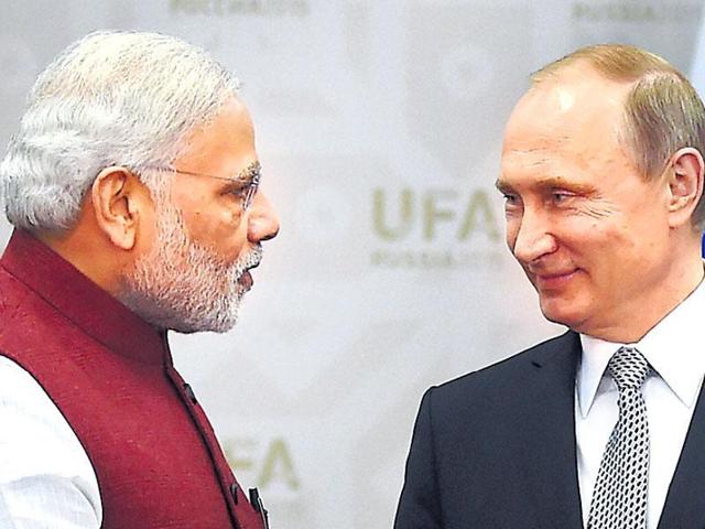 File photo of Prime Minister Modi with Russian President Vladimir Putin in Ufa, Russia.(PTI Photo)