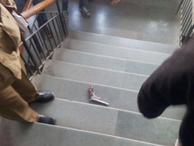 All the four attackers were caught by lawyers, litigants and police personnel present on the premises. Two pistols were recovered. (HT Photo) All the four attackers were caught by lawyers, litigants and police personnel present on the premises. Two pistols were recovered. (HT Photo)