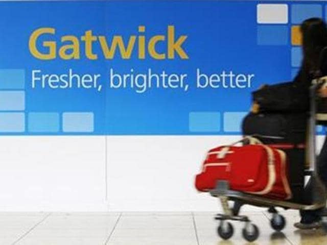 File photo of a passenger arriving at the Gatwick Airport in London. A British Muslim family was stopped from boarding a flight to Disneyland in US at the airport.(Reuters)