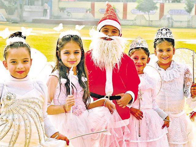 Children dressed up in colourful costumes during their school’s Christmas celebrations in Ludhiana. (Sikander Singh Chopra/HT photo) 