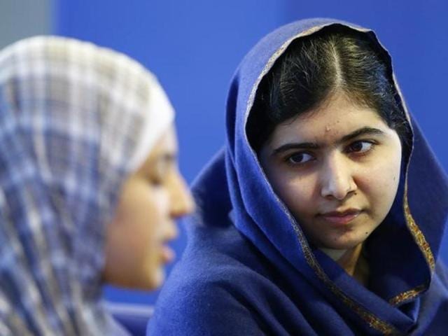 Malala Yousefzai (R) listens to 17 year old Syrian refugee Muzoon Almellehan speak to journalists at the City Library in Newcastle Upon Tyne, Britain. (Reuters) Malala Yousefzai (R) listens to 17 year old Syrian refugee Muzoon Almellehan speak to journalists at the City Library in Newcastle Upon Tyne, Britain. (Reuters)