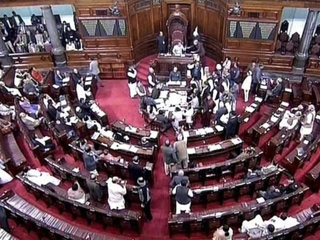 Opposition members protest in the Rajya Sabha.(PTI Photo)