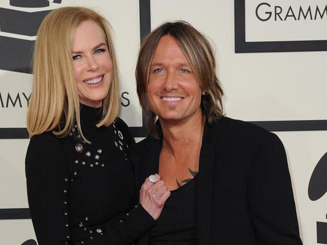 Dressed all in black, Nicole Kidman and Keith Urban also opted for the same haircut at the Grammy Awards. You can’t do better than that! (AFP)