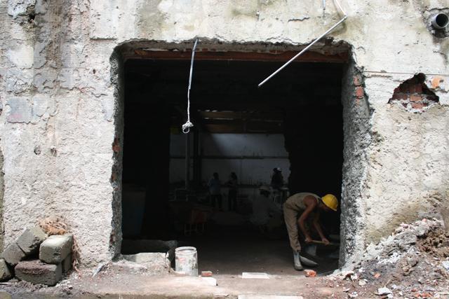 Breaking barriers: During the construction of the independent offices/shops/eateries, the different owners threw a ‘wall breaking party’ to break down the existing walls inside the storage house while retaining the original structure from the outside