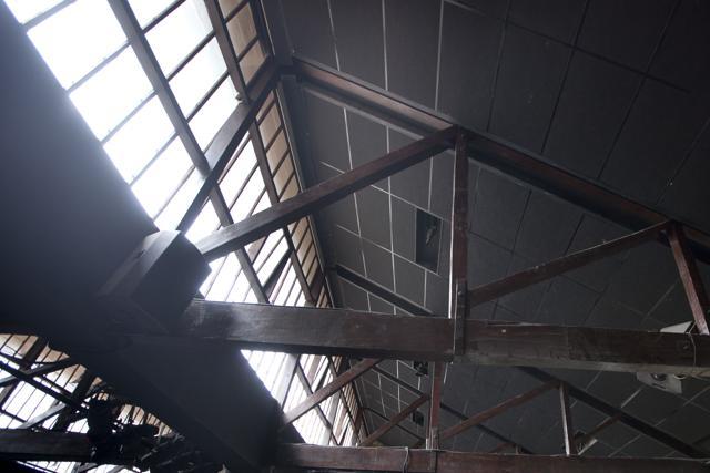 Northern light: The glass windows atop the roof were built to ensure that natural light streamed into the warehouse. The windows were built facing the north to light up the interiors with the maximum amount of sunlight pouring in. The panes are from the original construction as are the wooden beams supporting the roof. The wood is Burma teak, shipped from Myanmar. (Photo: Kunal Patil / HT) Northern light: The glass windows atop the roof were built to ensure that natural light streamed into the warehouse. The windows were built facing the north to light up the interiors with the maximum amount of sunlight pouring in. The panes are from the original construction as are the wooden beams supporting the roof. The wood is Burma teak, shipped from Myanmar. (Photo: Kunal Patil / HT)