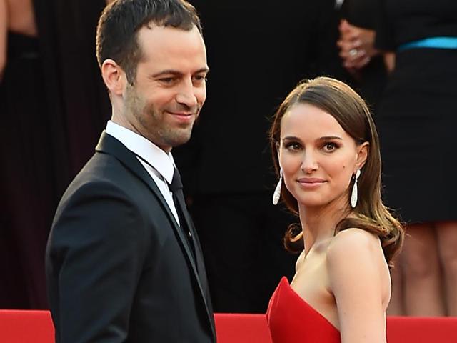 Natalie Portman and her choreographer husband made the sound sartorial choice of red and black. They were perfect examples of natural simplicity and elegance on the red carpet at the Cannes Film Festival. (AFP)