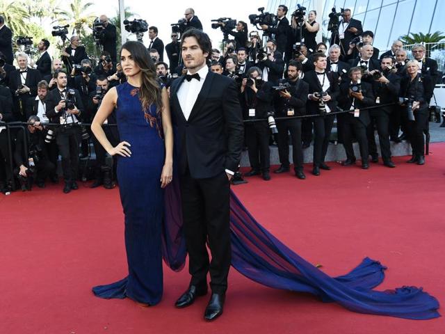 Although they weren’t wearing the same colors, this Hollywood couple was in perfect harmony on the steps of the red carpet at the Cannes Film Festival. (AFP)
