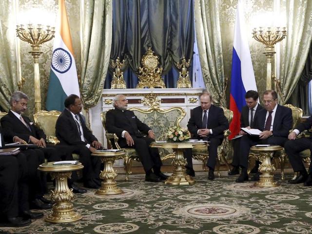Russia's President Vladimir Putin (4th R), India's Prime Minister Narendra Modi (3rd L) and members of their delegations attend a meeting at the Kremlin in Moscow.(REUTERS) Russia's President Vladimir Putin (4th R), India's Prime Minister Narendra Modi (3rd L) and members of their delegations attend a meeting at the Kremlin in Moscow.(REUTERS)