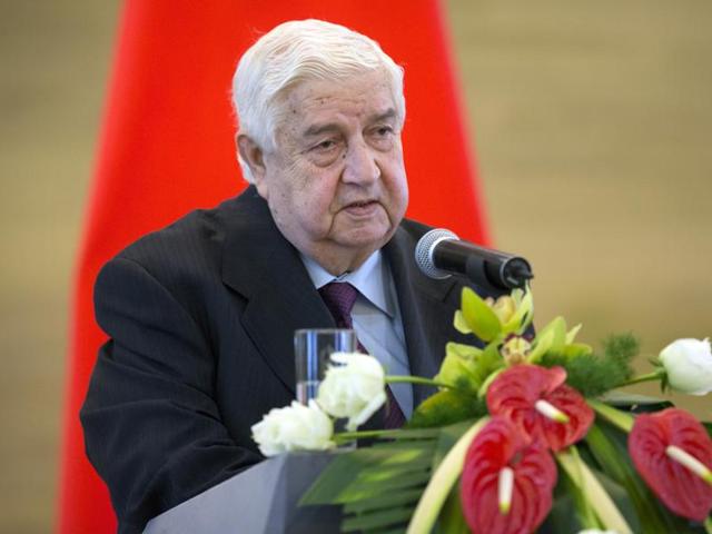 Syrian Foreign Minister Walid al-Moallem speaks during a press briefing with his Chinese counterpart Wang Yi at China's ministry of foreign affairs in Beijing.(AP Photo)