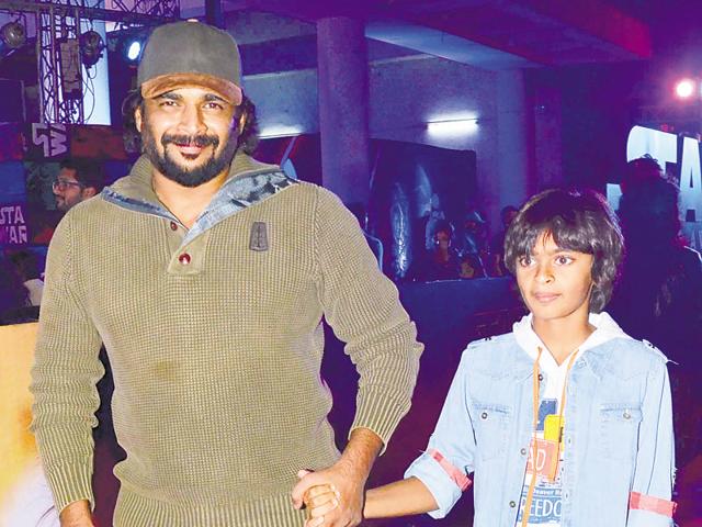 Madhavan with son Vedant at the Star Wars premiere. (Yogen Shah/HT Photo)