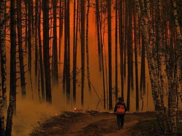 Out of control fires and deadly floods have hit Russia nearly every year this decade, and the emergency situations ministry in October conceded it has to come up with a new strategy. (AFP Photo) Out of control fires and deadly floods have hit Russia nearly every year this decade, and the emergency situations ministry in October conceded it has to come up with a new strategy. (AFP Photo)