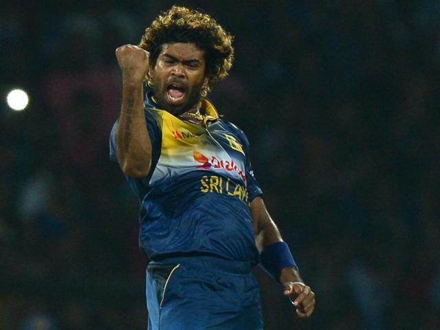 Sri Lanka's captain Lasith Malinga and Nuwan Kulasekera celebrate their team's victory over West Indies in their first Twenty20 cricket match in Pallekele, Sri Lanka.(AP Photo)
