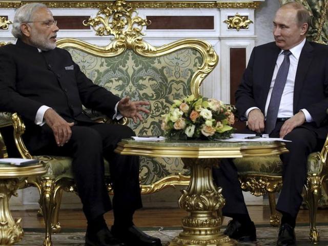 Russia's President Vladimir Putin (L) shakes hands with India's Prime Minister Narendra Modi during a meeting at the Kremlin in Moscow, Russia.(REUTERS) Russia's President Vladimir Putin (L) shakes hands with India's Prime Minister Narendra Modi during a meeting at the Kremlin in Moscow, Russia.(REUTERS)