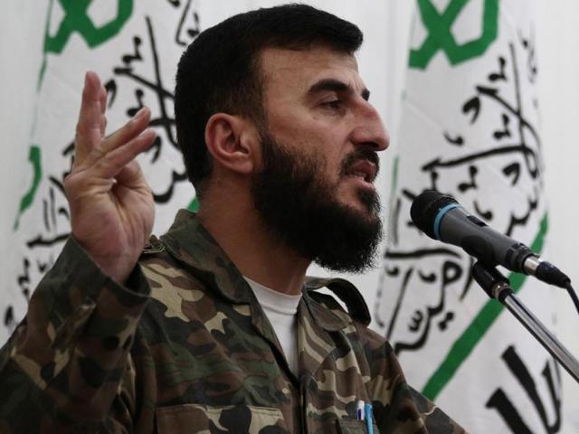 A file photo showing Zahran Alloush, the leader of Jaysh al-Islam (Islam Army), speaking during a press conference in the rebel-held Eastern Ghouta region outside the capital Damascus.(AFP Photo)