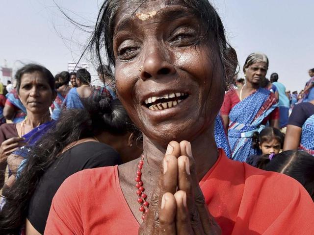 A woman in Chennai cries as she offers prayers to the tsunami victims. (PTI) A woman in Chennai cries as she offers prayers to the tsunami victims. (PTI)