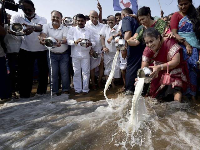 People pour milk into the sea at an event to mark the 11th anniversary of the 2004 tsunami, in Chennai. (PTI) People pour milk into the sea at an event to mark the 11th anniversary of the 2004 tsunami, in Chennai. (PTI)