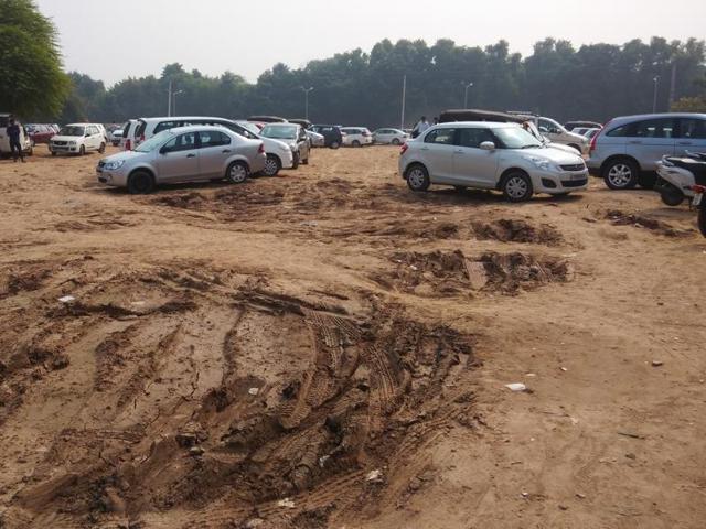 The situation becomes even more difficult during the rain, as the parking area becomes sludgy, thereby causing trouble in parking vehicles. (HT PHOTO) The situation becomes even more difficult during the rain, as the parking area becomes sludgy, thereby causing trouble in parking vehicles. (HT PHOTO)